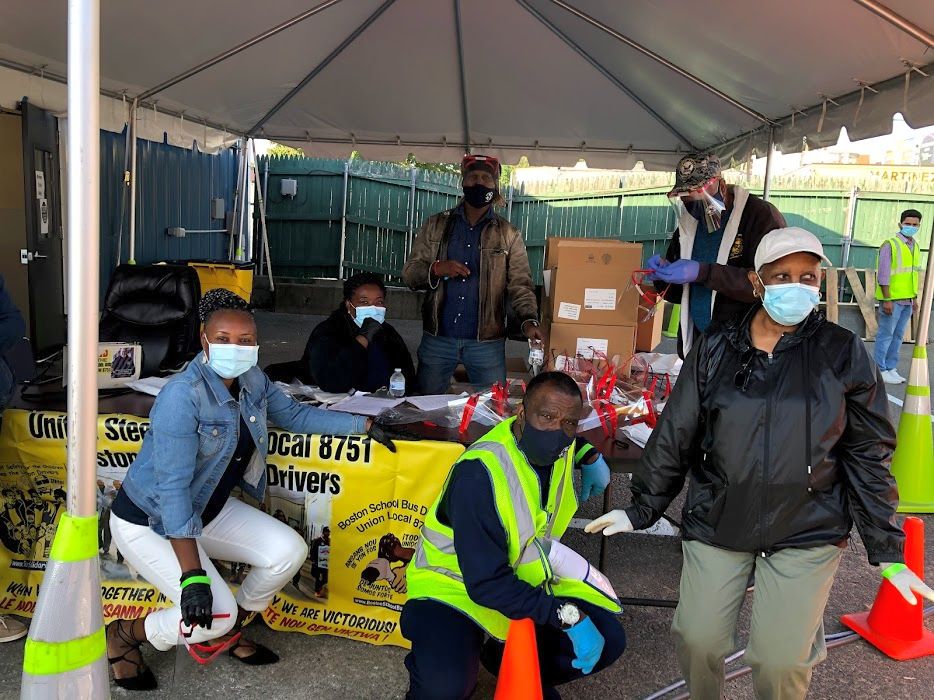 Local 8751 leaders distributing Steelworker-made, American Roots Wear’s two-ply, filtered cloth masks and USW-donated face-shields to replace substandard, company-issued, disposable paper at driver route bid, Sept. 23, 2020. Credit: WW Photo: Steve Gillis.